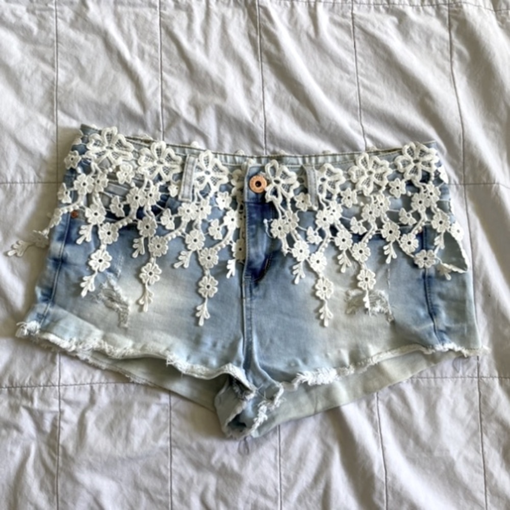 Light Jean shorts with lace draping from the top ⭐️